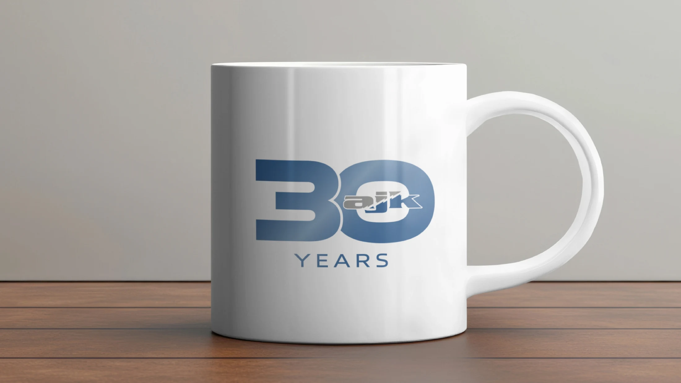 AJK 30-year anniversary identity applied to a mug