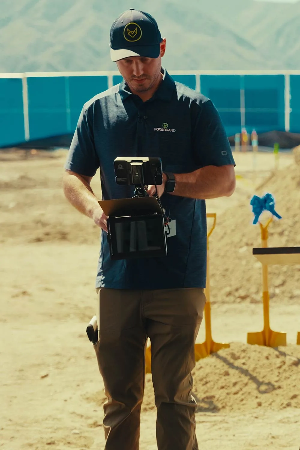 Max Halberg working with a production camera on location