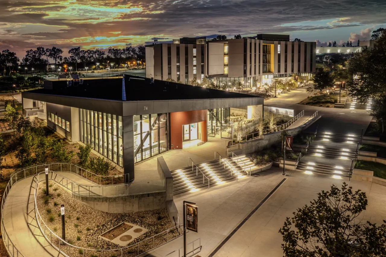 Aerial architectural photograph of the completed Cal State Dominguez Hills dining commons at dusk