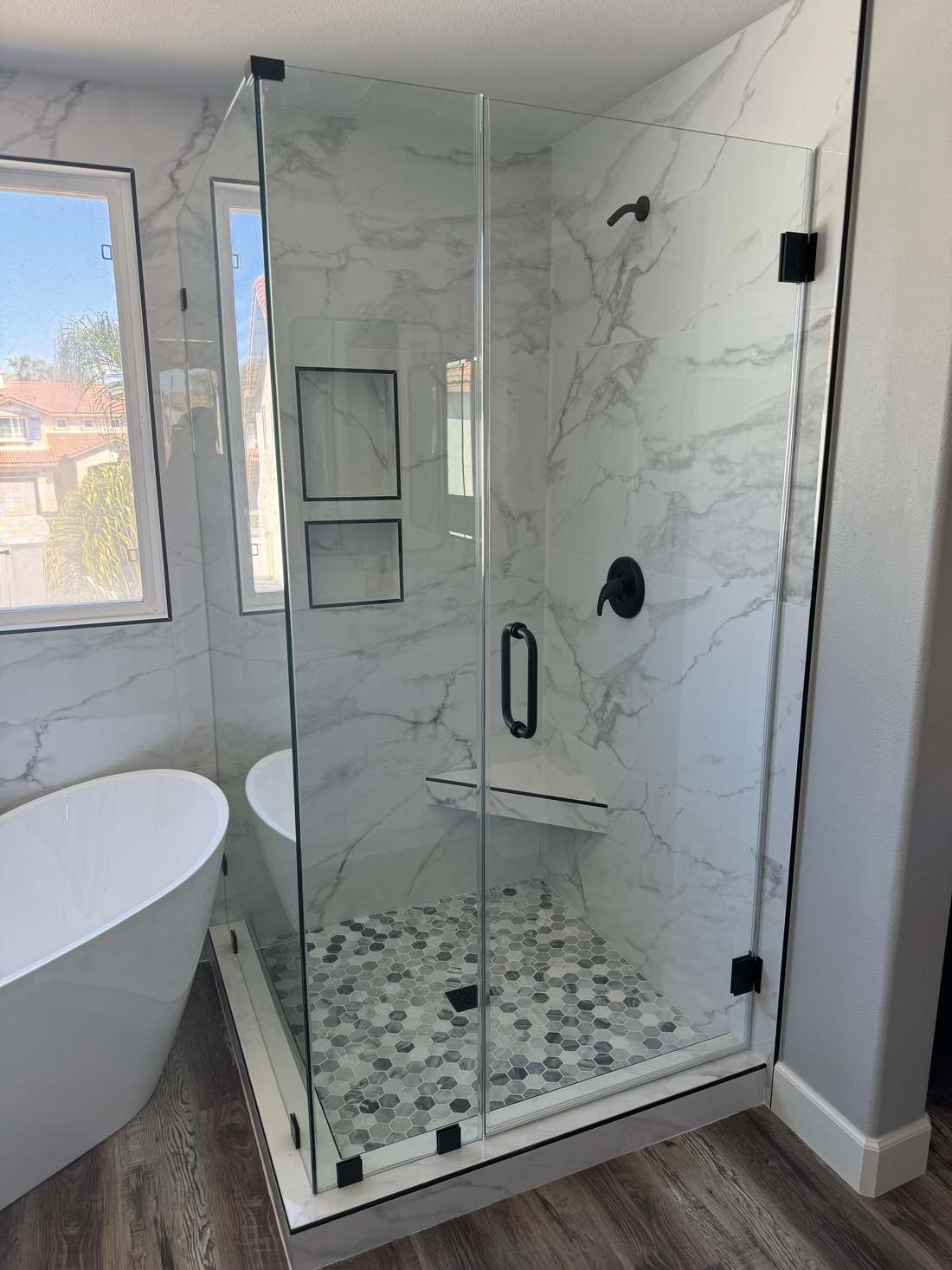 Remodeled bathroom with freestanding tub
