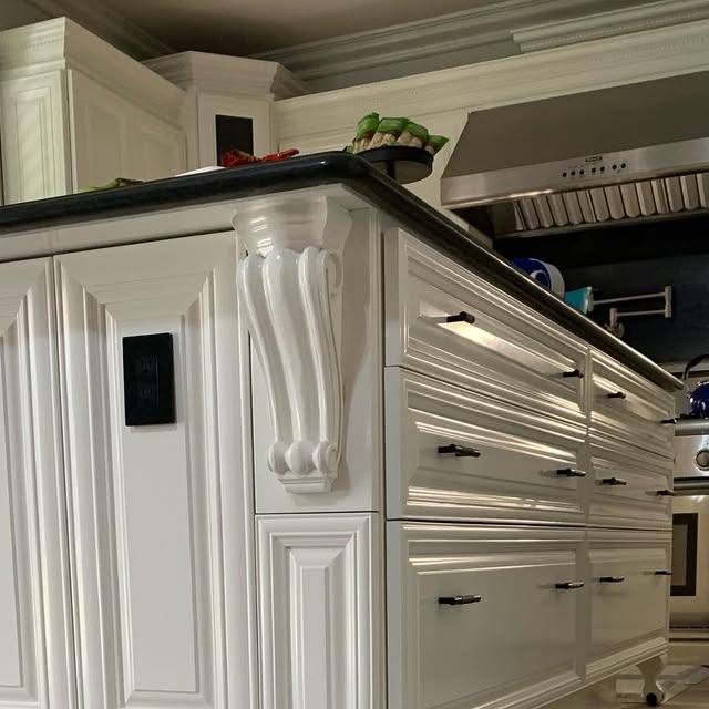 Kitchen with existing custom cabinets kept and refinished